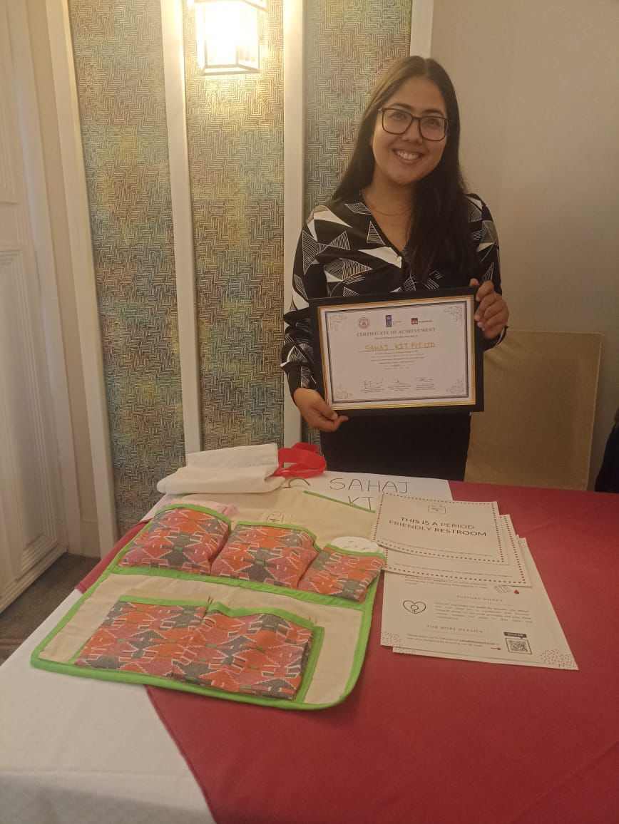 Sonika Mahat holding the Sahaj Kit Certificate of Achievement from the Urban Innovation Program